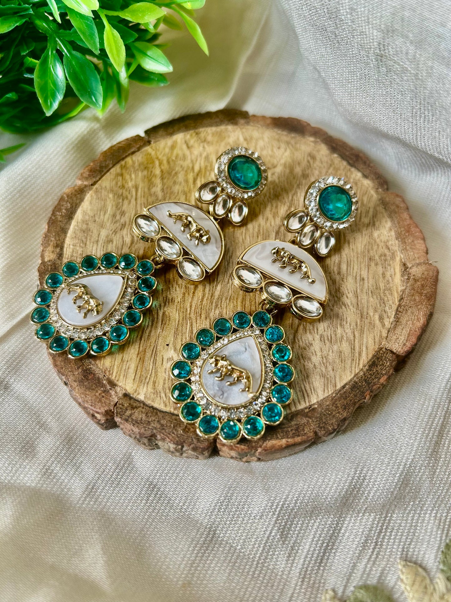 Sabyasachi earrin aqua Color
