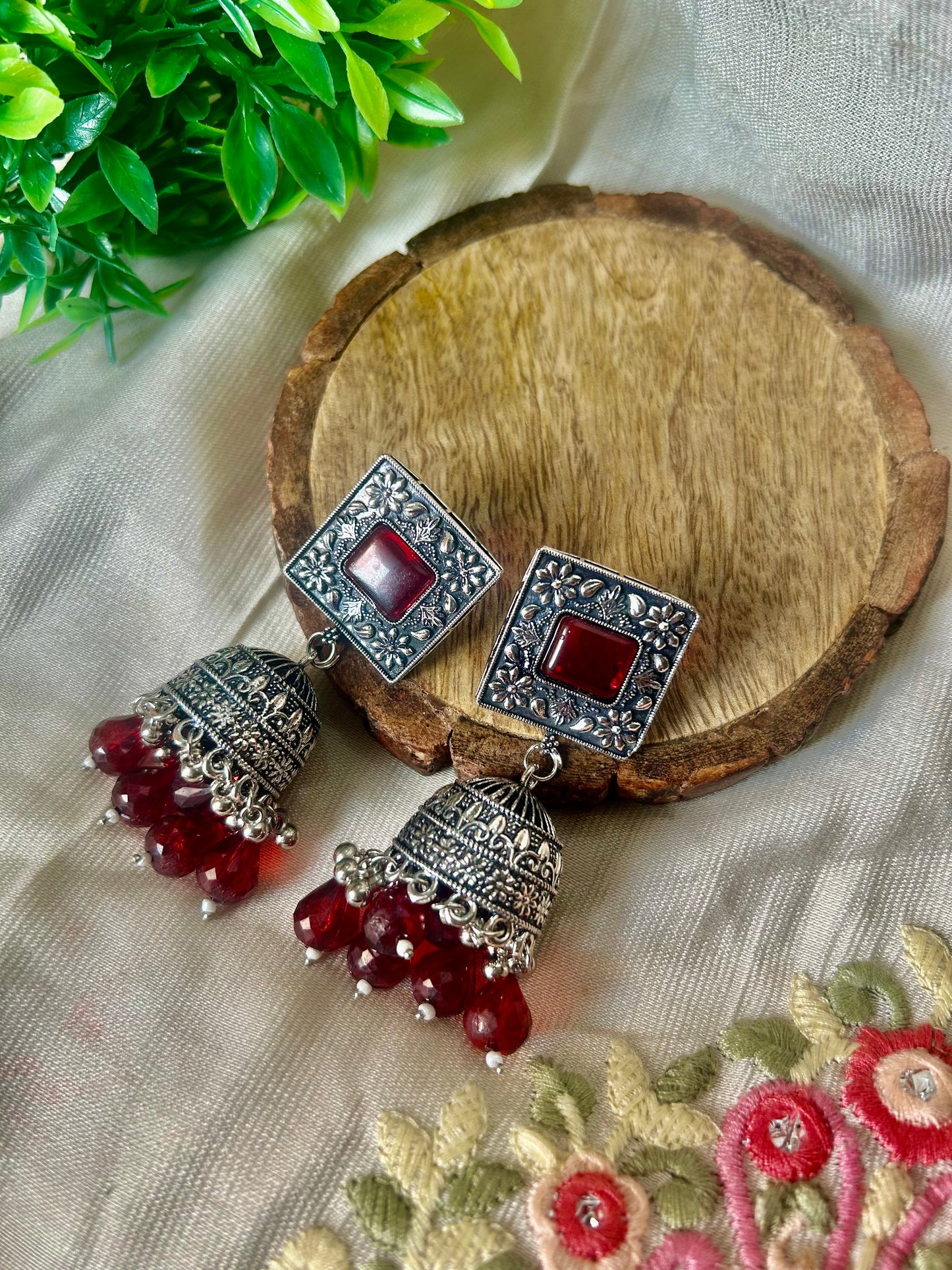 Maroon metal oxidised earrings